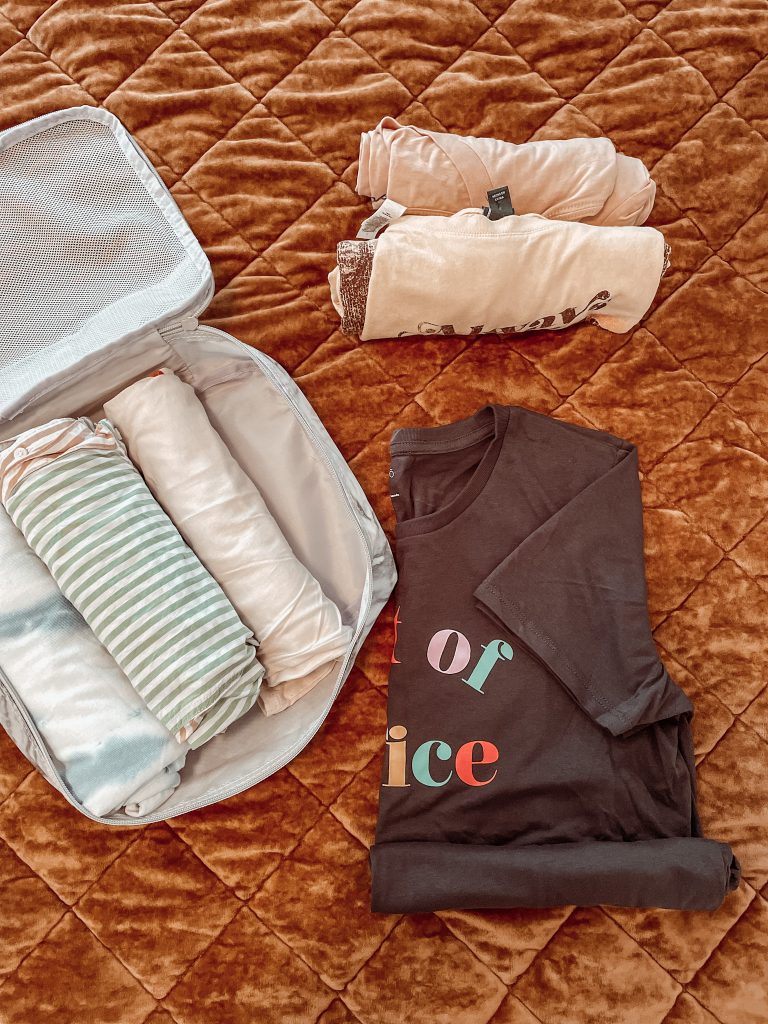 how to roll clothes for packing